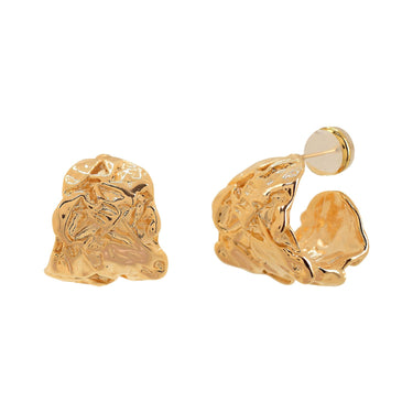 Small gold hoop earrings, with irregular texture