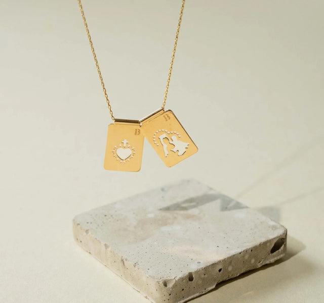 Scapular 14 k gold necklace with no closure, featuring two rectangular medals, one medal depicts the Virgin Mary, and the other depicts the Sacred Heart