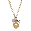 Gold necklace with tree charms the Sacred Heart, St. Benedict, and the Victory Cross.