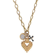 Gold necklace with tree charms the Sacred Heart, St. Benedict, and the Victory Cross.