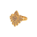 Gold ring featuring a heart-shaped design with zircon 