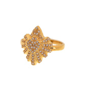 Gold ring featuring a heart-shaped design with zircon 