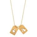 Scapular gold necklace with no closure,  featuring two rectangular medals, one medal depicts the Virgin Mary, and the other depicts the Sacred Heart